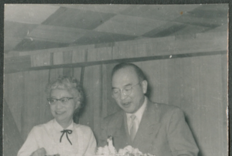 Agnes and Chester Sakura holding a cake (ddr-densho-523-283)