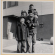 Four children outside building (ddr-densho-522-65)