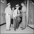 Japanese Americans being inspected upon leaving camp (ddr-densho-37-787)
