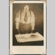 Elderly man with birthday cake (ddr-densho-321-230)