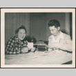 Couple sitting at table (ddr-densho-293-152)