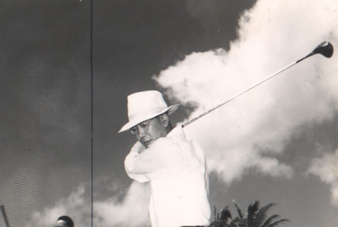 Hayato Ikeda swinging a golf club (ddr-njpa-4-149)