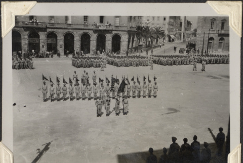 Men in formation receiving citations, seen from above (ddr-densho-466-762)