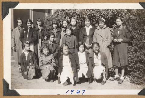 Group of girls in dark coats (ddr-densho-542-183)