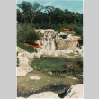 Waterfall and pond at the Schulman project. (ddr-densho-377-189)