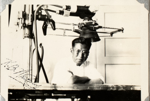 Man with lab equipment (ddr-densho-587-70)