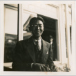 Man standing by open window (ddr-densho-426-1663)