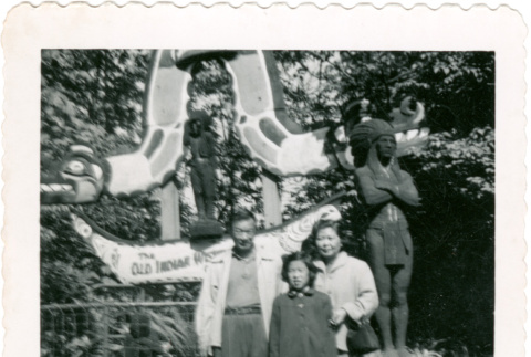 Family in front of sign (ddr-densho-430-198)