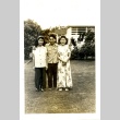 Danny Y. Teruda with two women (ddr-densho-22-283)