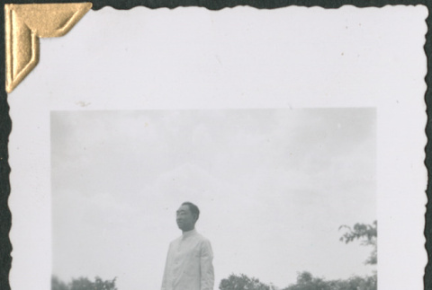 Man standing in field (ddr-densho-434-153)