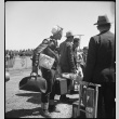 Japanese Americans arriving at Tanforan (ddr-densho-151-162)