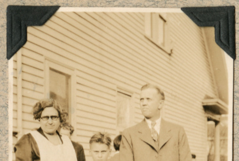 Mr. and Mrs. Sherar standing outside with child (ddr-densho-383-29)