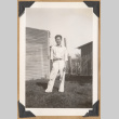 Gary Kikawa on a grassy lawn (ddr-densho-542-157)