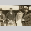 Four men standing outside (ddr-njpa-1-1002)