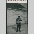 Boy holding a dog (ddr-densho-523-290)