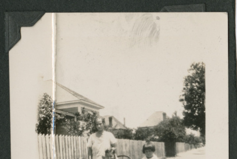 woman and 3 children outside (ddr-densho-378-488)
