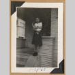 Girl holding a small dog (ddr-densho-542-230)