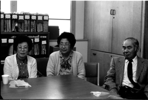 Two women and Tim Nomiyama at table (ddr-densho-1007-1144)
