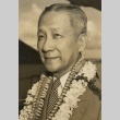 A man wearing leis (ddr-njpa-1-1263)
