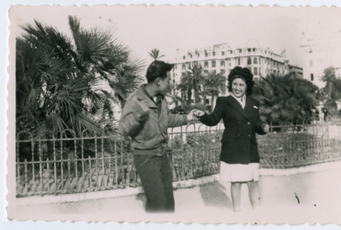 Man and woman holding hands in park (ddr-densho-368-180)