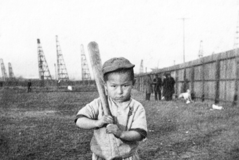Young boy holding baseball bat (ddr-ajah-5-68)