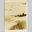 Photograph of Swedish planes flying over a rural area (ddr-njpa-13-1111)