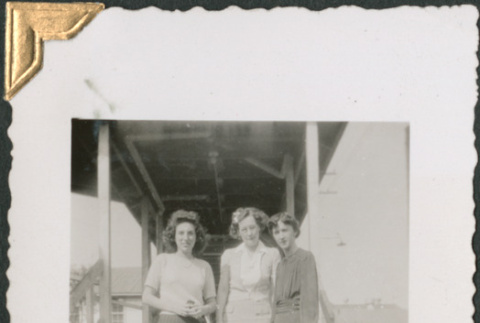 Three women standing on stairs (ddr-densho-434-208)