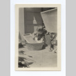 Baby playing with a washing board (ddr-one-6-3)