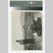 Man standing by headstone (ddr-densho-255-178)