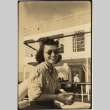 Woman sitting on deck of ship (ddr-densho-426-1800)