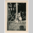 Toddler boy with dog statue (ddr-densho-313-60)