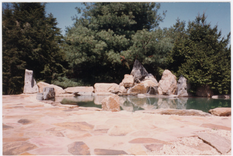 Pool with rock landscaping (ddr-densho-377-1907)