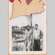 Two men standing near cars (ddr-densho-493-70)