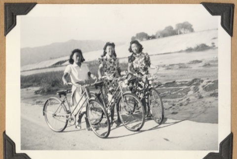Three girls with bicycles (ddr-densho-542-232)