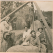 Group of men placing boulders for landscaping (ddr-densho-377-164)