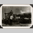 Group working with farm machinery (ddr-densho-587-88)