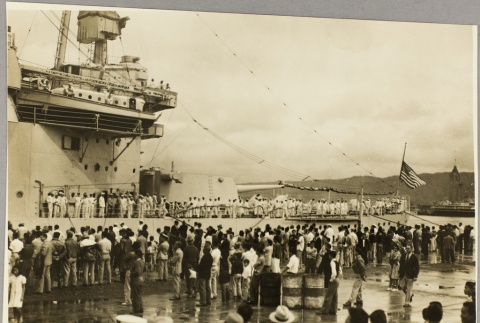 Crowd of civilians gathered to greet sailors on board the USS Astoria (ddr-njpa-13-352)