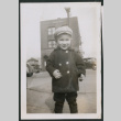 Photo of a child in a coat and hat (ddr-densho-483-758)