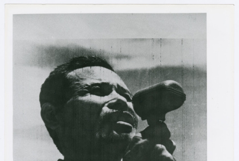 Japanese serviceperson Taira Koshuin calling for Japanese surrender in Guam (ddr-densho-1007-257)