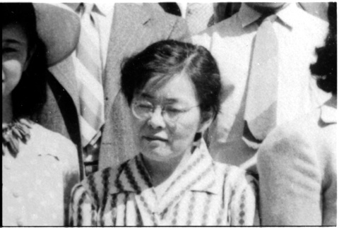 Woman in crowd (ddr-densho-1007-1276)