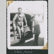 Two men unloading truck (ddr-densho-434-193)
