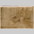 Two girls with paper parasols (ddr-densho-426-1950)