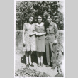 Two women and one soldier outside (ddr-densho-1007-792)