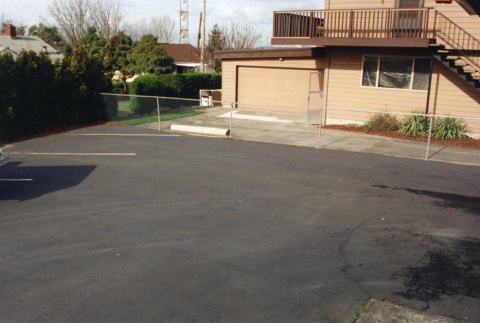Parking lot and neighboring building at office building (ddr-densho-354-662)