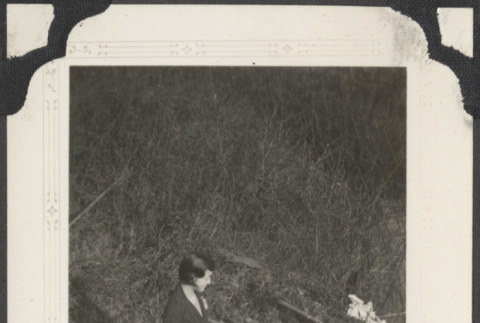 Rose Yamada standing in a field (ddr-densho-432-161)