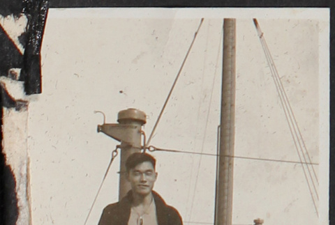 Two men with Hikawa Maru Tokyo life ring (ddr-densho-326-91)