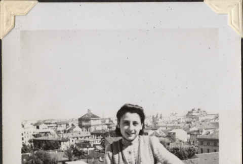 Woman standing on rooftop (ddr-densho-466-828)