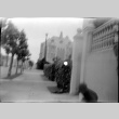 View of street looking toward building (ddr-densho-426-1133)