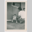 Toddler girl with two women (ddr-densho-329-1278)