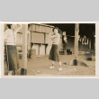 Tomoye (Nozawa) Takahashi and Martha (Nozawa) Tsuchida Suzuki with gold clubs (ddr-densho-426-2192)